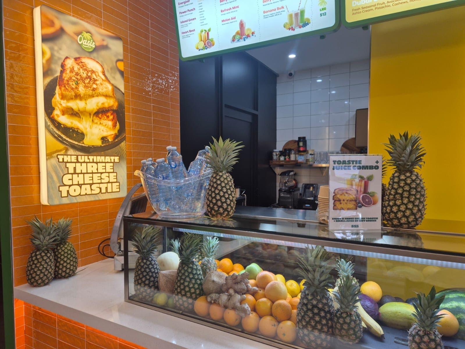 Fresh pineapples, ginger and citrus at the Oasis produce counter